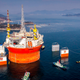 Illustration for article titled Here's The Largest Oil Rig Ever On Top Of The Largest Transport Ship